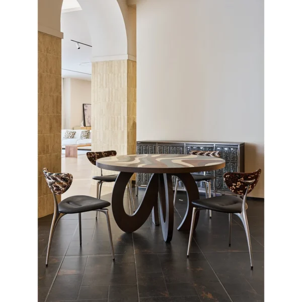Flowing Marquetry Round Table on Sculptural Wave Base in clay — in a room setting
