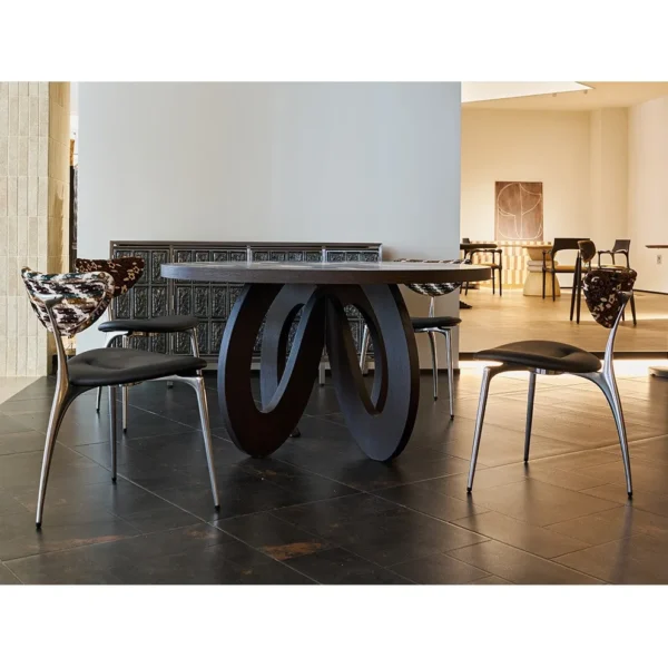 Flowing Marquetry Round Table on Sculptural Wave Base in clay — in a room setting