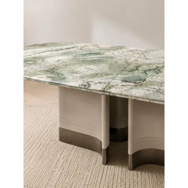 Victoria Green Stone Oval Dining Table on Fluted Stone Base in olive — in a room setting