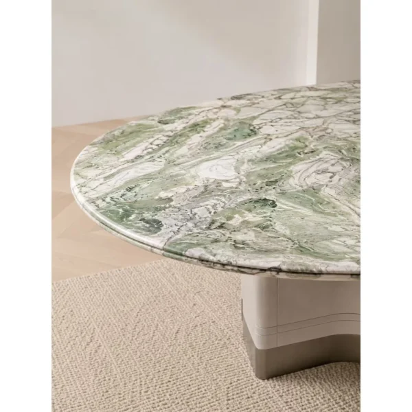 Victoria Green Stone Oval Dining Table on Fluted Stone Base in olive — in a room setting