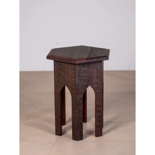 Forest Trace Carved Solid Wood Side Table with Arched Base in clay — in a room setting