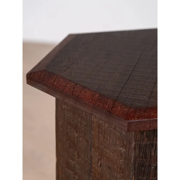 Forest Trace Carved Solid Wood Side Table with Arched Base in clay — in a room setting