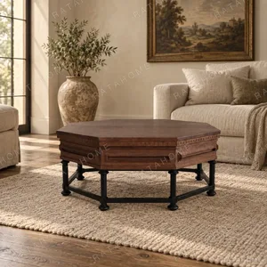 Forge Carved Octagonal Solid Wood Coffee Table, 100 cm in clay — in a room setting