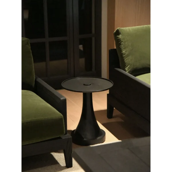 Forged Brass Round Side Table with Textured Top, 40 cm in black — in a room setting