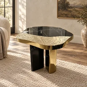 Cloud Black Marble Side Table on Forged Black and Gold Base in black — in a room setting