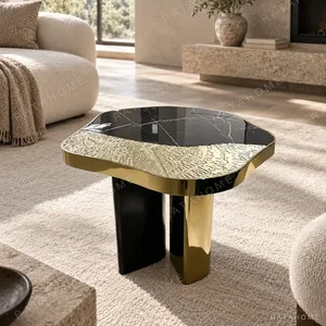 Cloud Black Marble Side Table on Forged Black and Gold Base in black — in a room setting