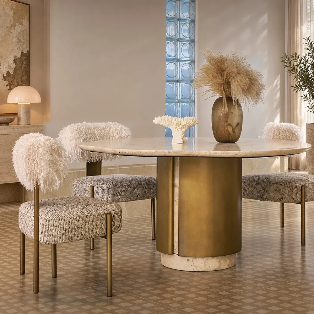 Four Seasons Pink Stone Wave-Edge Dining Table on Brass Base in rose stone — front view