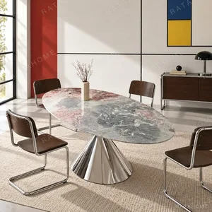 Oval Four Seasons Pink Marble Dining Table in rose stone — in a room setting