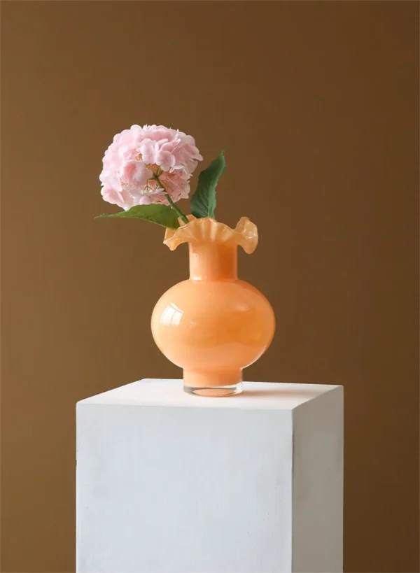 French Mid-Century Ruffled Gourd Glass Vase in rust — in a room setting
