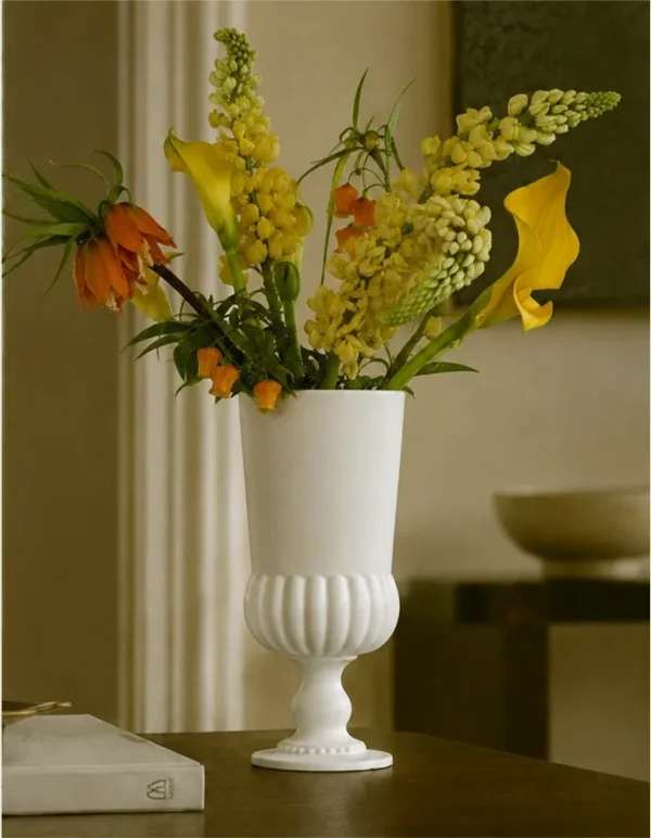 French Mid-Century Matte White Fluted Stem Vase in ivory — in a room setting