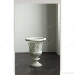 Roman Relief Urn Floor Vase in Antique White — in a room setting