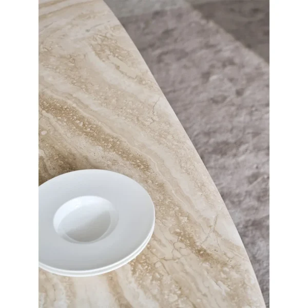 French Travertine Dining Table on Black Oak Column-Base Legs in oatmeal — in a room setting