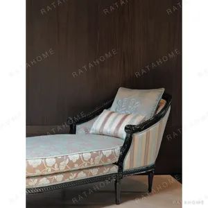 French Vintage Chaise Lounge in rose stone — in a room setting