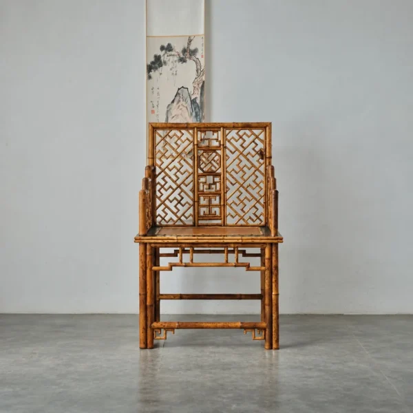 Fretwork High-Back Bamboo Armchair in clay — in a room setting