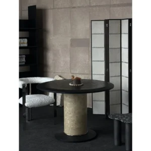 Full Moon Black Marble Round Dining Table in black — in a room setting