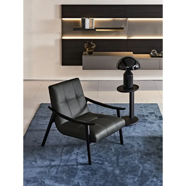 Fynn Black Ash Lounge Chair in Caramel Microfibre Leather — in a room setting