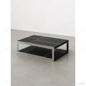 Brushed Black Wood Coffee Table in black — in a room setting