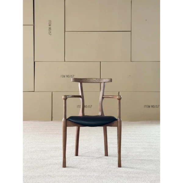 Ash Sculptural Armchair with Saddle Leather Seat, 55 cm in walnut — in a room setting