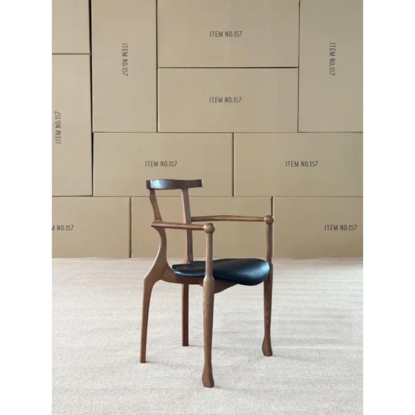 Ash Sculptural Armchair with Saddle Leather Seat, 55 cm in walnut — in a room setting