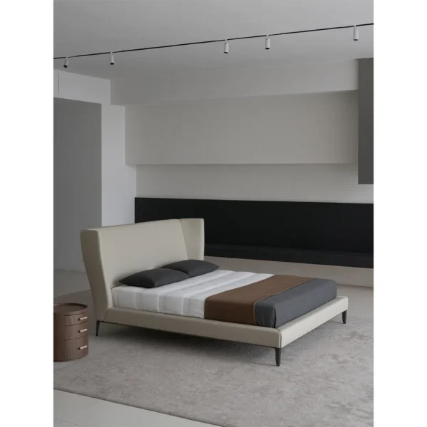 Gentleman High-Back Leather Bed with Wrapped Headboard in slate — in a room setting
