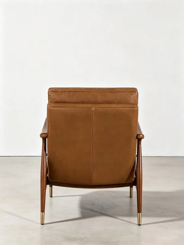 Walnut Lounge Chair in Vintage Tan Leather with Brass — in a room setting
