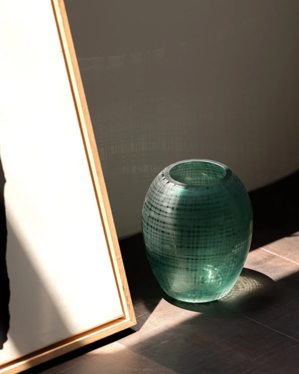 Green Cross-Hatched Oval Glass Vase in olive — in a room setting