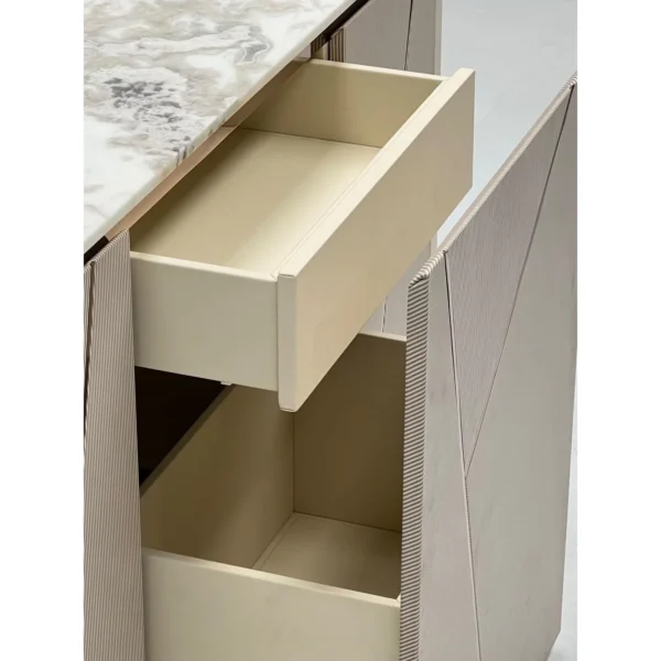 Geometric Leather Sideboard with Sintered Stone Top in sand — in a room setting