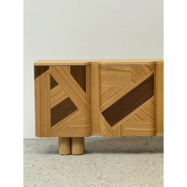 Geometric Marquetry Veneer Entryway Cabinet on Cylinder Legs in natural oak — in a room setting