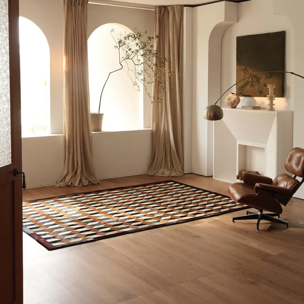 Geometric Patchwork Cowhide Rug in Brown and Cream — front view