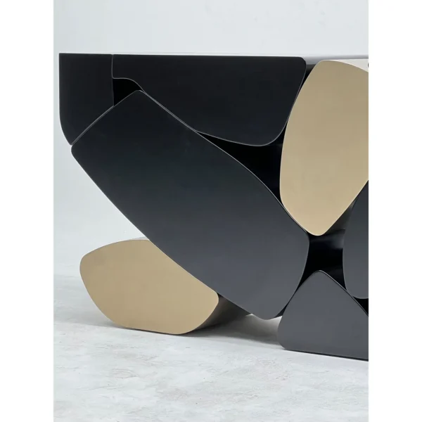 Stacked Pebble Sculptural Console in Black and Champagne — in a room setting