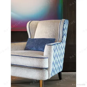 Geometric Wingback Armchair in oatmeal — in a room setting