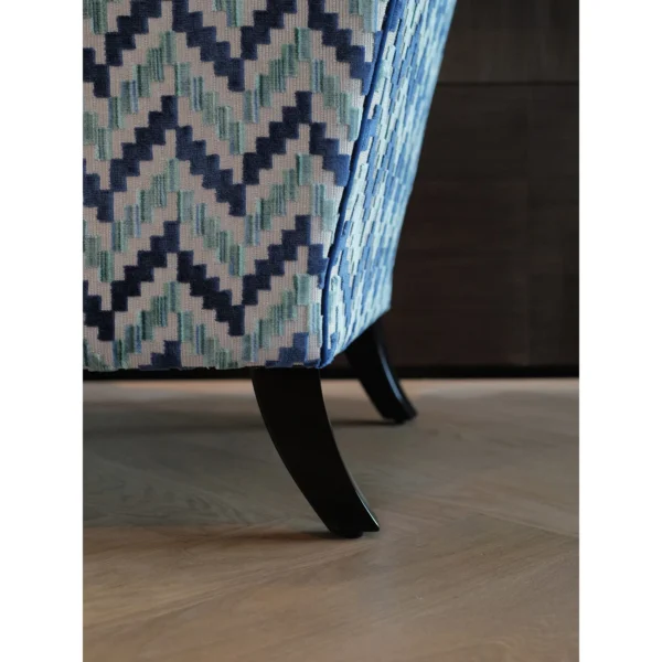 Geometric Wingback Armchair in oatmeal — in a room setting