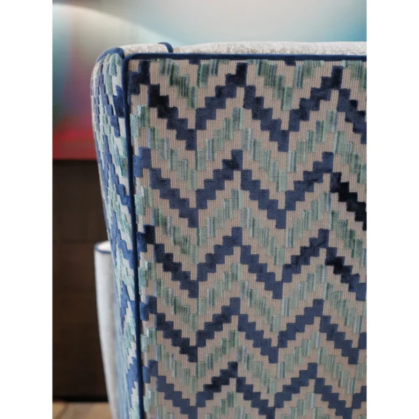 Geometric Wingback Armchair in oatmeal — in a room setting