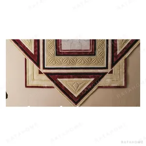 Geometric Wall Tapestry in Cream, Burgundy and Gold — in a room setting