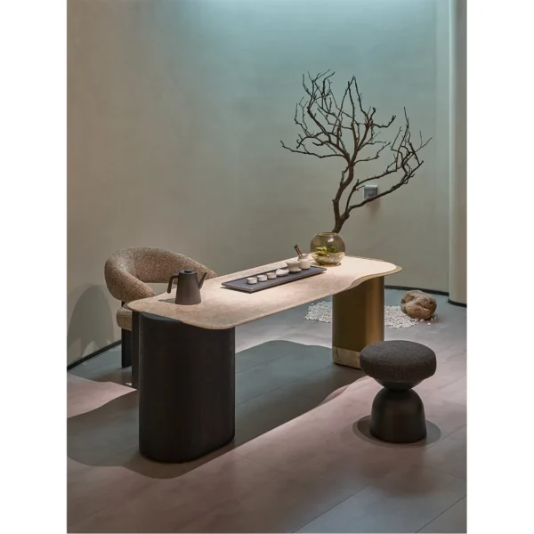 Floating Gold Marble Curved Tea Table in oatmeal — in a room setting