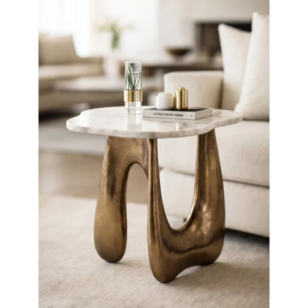 Cloud Marble Side Table on Gilded Sculptural Base in ivory — in a room setting
