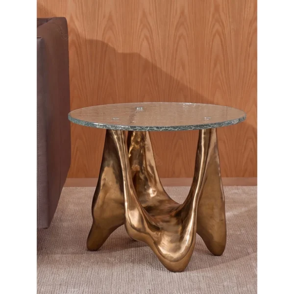 Ripple Glass Round Side Table on Gilded Sculptural Base in brushed brass — in a room setting