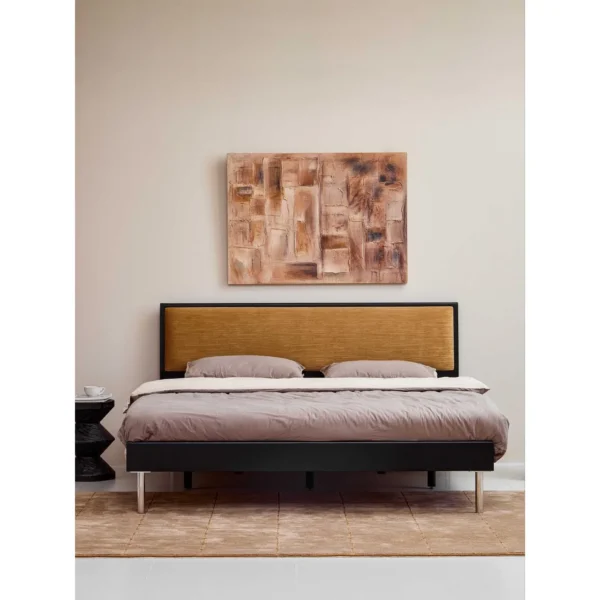 Ginger Velvet Bed with Dark Frame in mustard — in a room setting