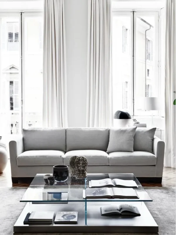 Glass Top Coffee Table on Grey Lacquered Plinth, 120 cm in slate — in a room setting