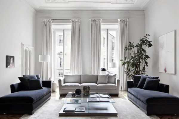 Glass Top Coffee Table on Grey Lacquered Plinth, 120 cm in slate — in a room setting