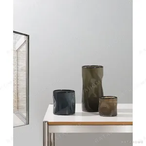 Hand-Blown Pleated Glass Vases in Pale Green and Smoke — in a room setting