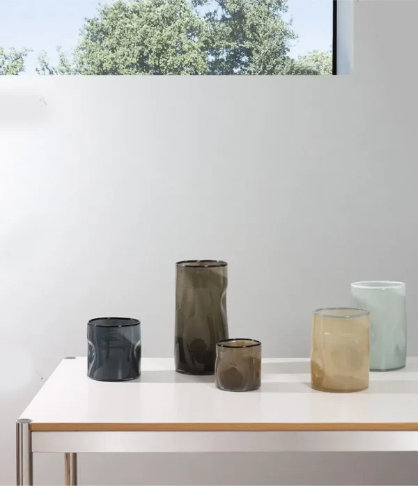 Hand-Blown Pleated Glass Vases in Pale Green and Smoke — in a room setting