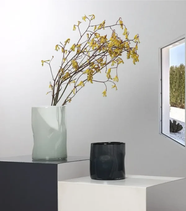 Hand-Blown Pleated Glass Vases in Pale Green and Smoke — in a room setting