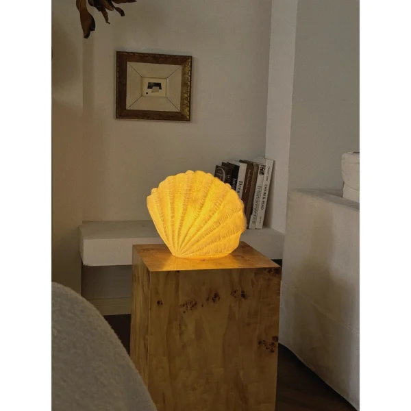 Glowing Shell Table Lamp in Ridged Resin — in a room setting