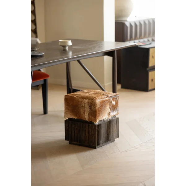 Goat Hide Teak Drum Stool with Fluted Base in clay — in a room setting