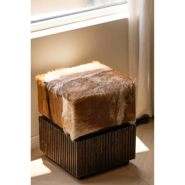 Goat Hide Teak Drum Stool with Fluted Base in clay — in a room setting