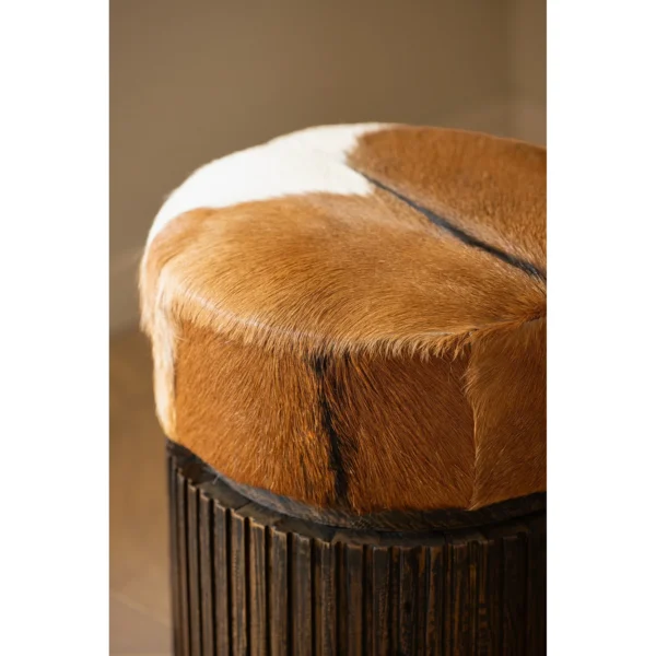 Goat Hide Teak Drum Stool with Fluted Base in clay — in a room setting