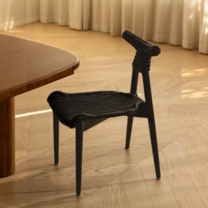 Goat Horn Black Teak Chair with Woven Rattan Seat in black — front view