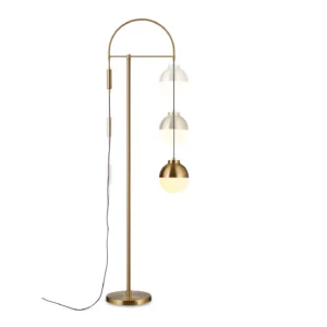 Gold Arc Floor Lamp with Three Glass Half-Domes in brushed brass — in a room setting