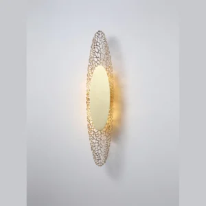 Gold Coral Lace Oval Wall Light in brushed brass — in a room setting